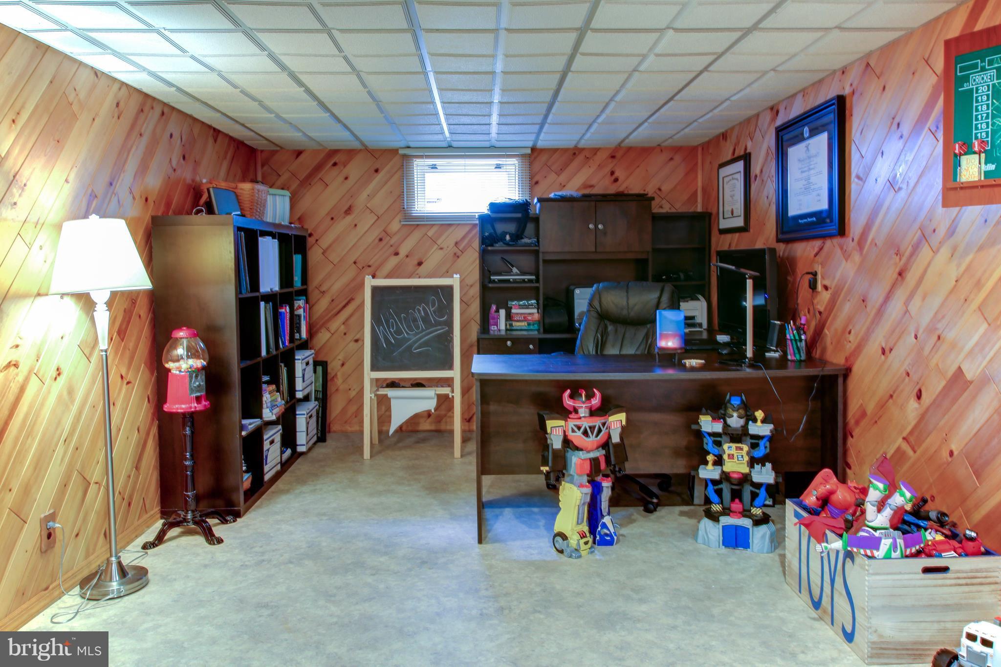 505 Sunset Knoll Road Pasadena, MD 21122 - Photo 20 of 26 PART OF FAMILY ROOM IS USED FOR AN OFFICE.