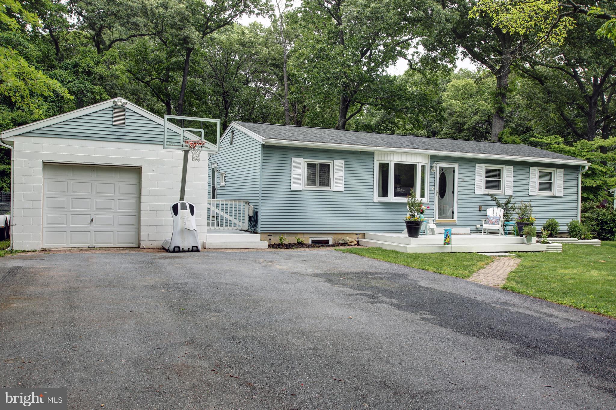 505 Sunset Knoll Road Pasadena, MD 21122 - Photo 21 of 26 ONE CAR GARAGE WITH LOTS OF DRIVEWAY FOR PARKING.