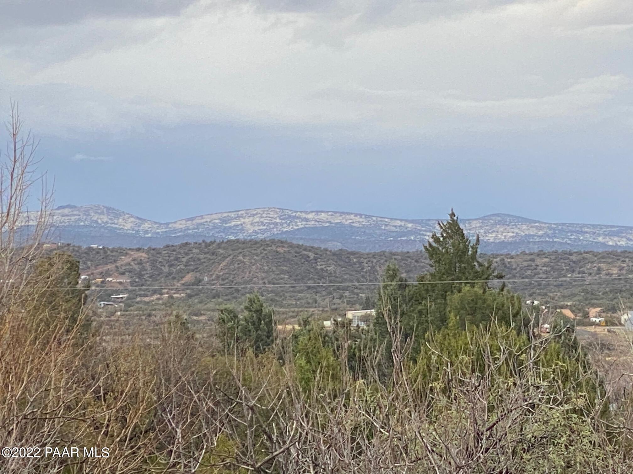 4869 North Gone Fishin Road Rimrock, AZ 86335 - Photo 1 of 10 a view of a city with mountains in the background