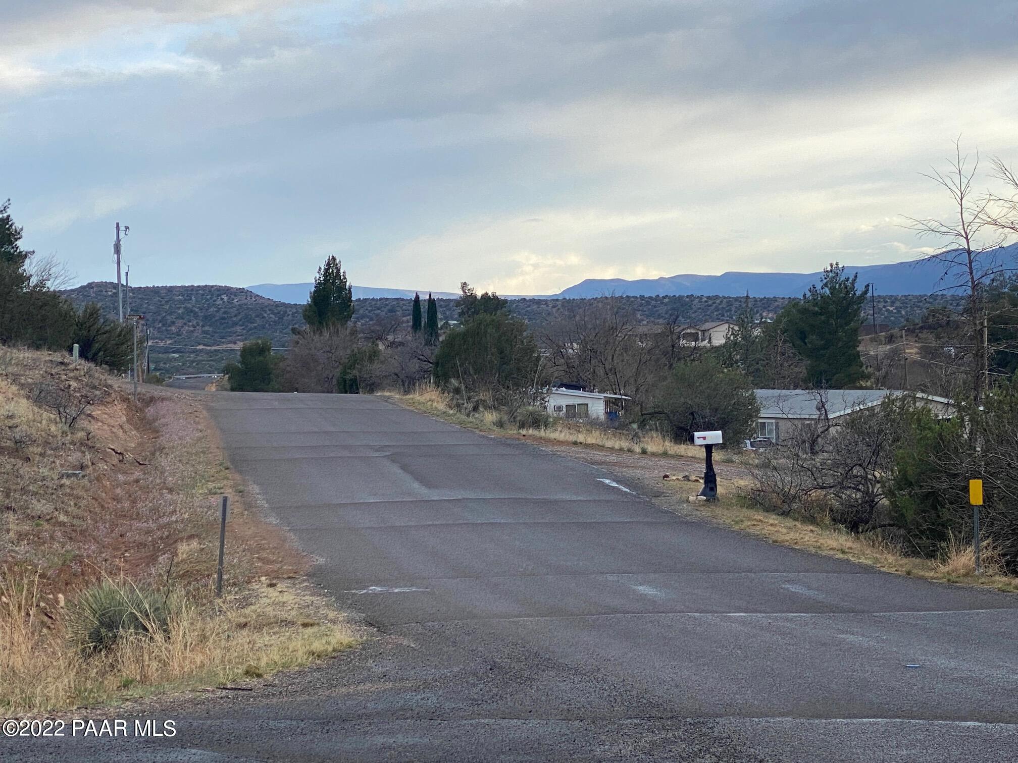 4869 North Gone Fishin Road Rimrock, AZ 86335 - Photo 4 of 10 a view of a road with a yard