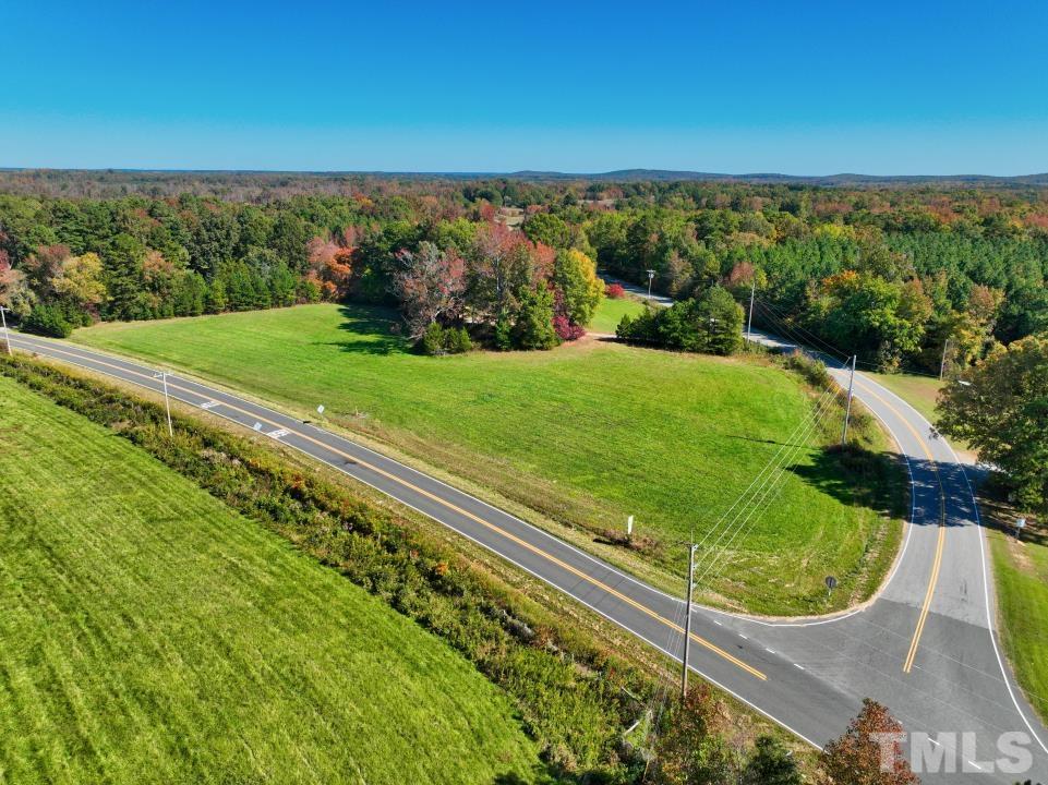 111 Berea Road Rougemont, NC 27572 - Photo 5 of 14 a view of a yard with a garden