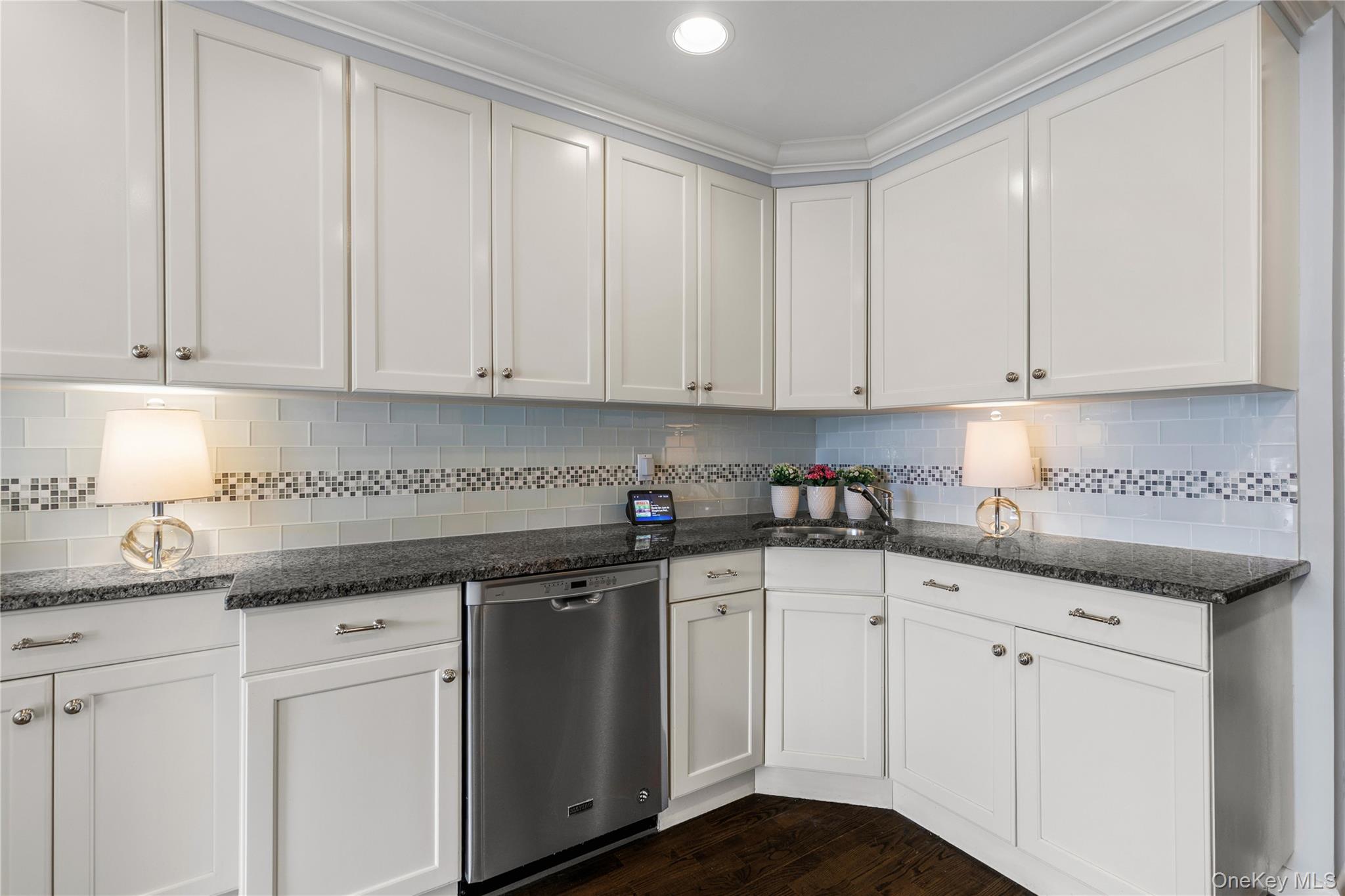 720 Milton Road, Unit SOUTH 3B Rye, NY 10580 - Photo 16 of 33 Stainless steel dishwasher and refrigerator.