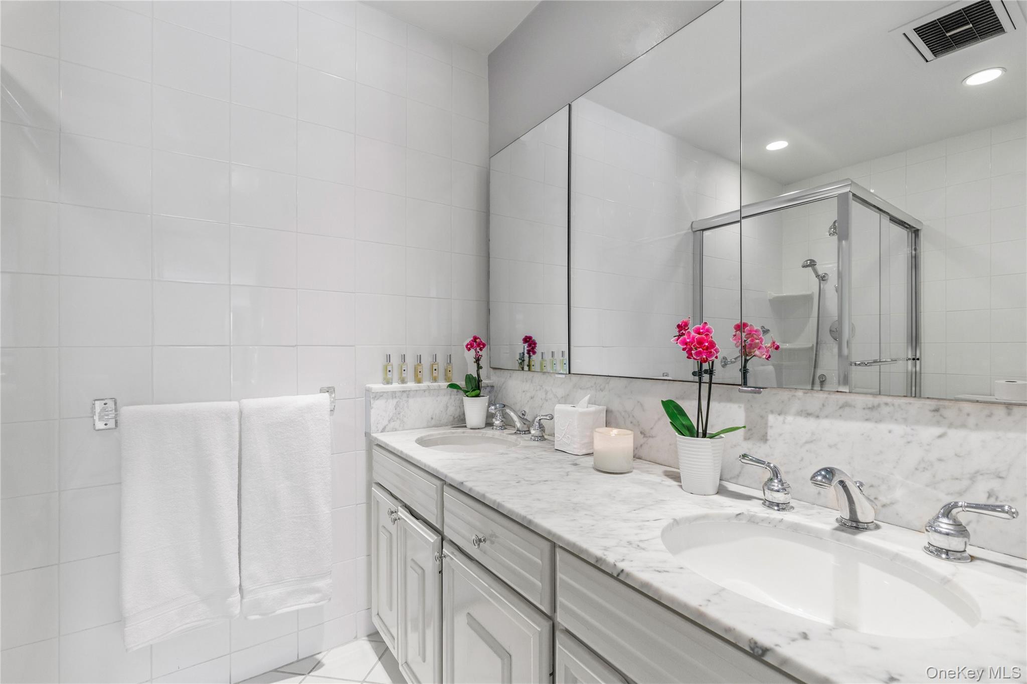 720 Milton Road, Unit SOUTH 3B Rye, NY 10580 - Photo 25 of 33 Primary bath features a double vanity and spacious shower.