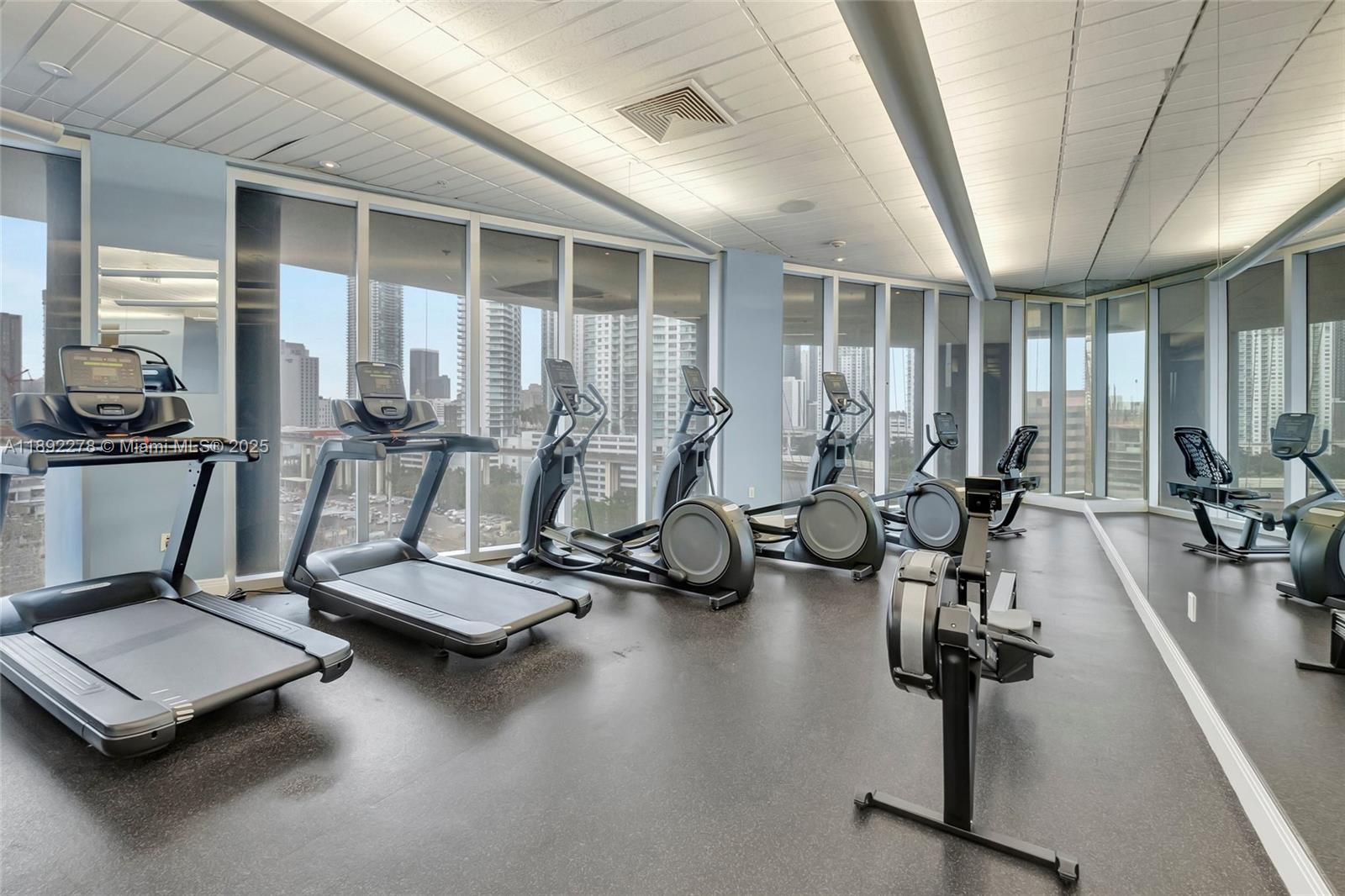 185 Southwest 7th Street, Unit 2312 Miami, FL 33130 - Photo 26 of 32 a view of a room with gym equipment