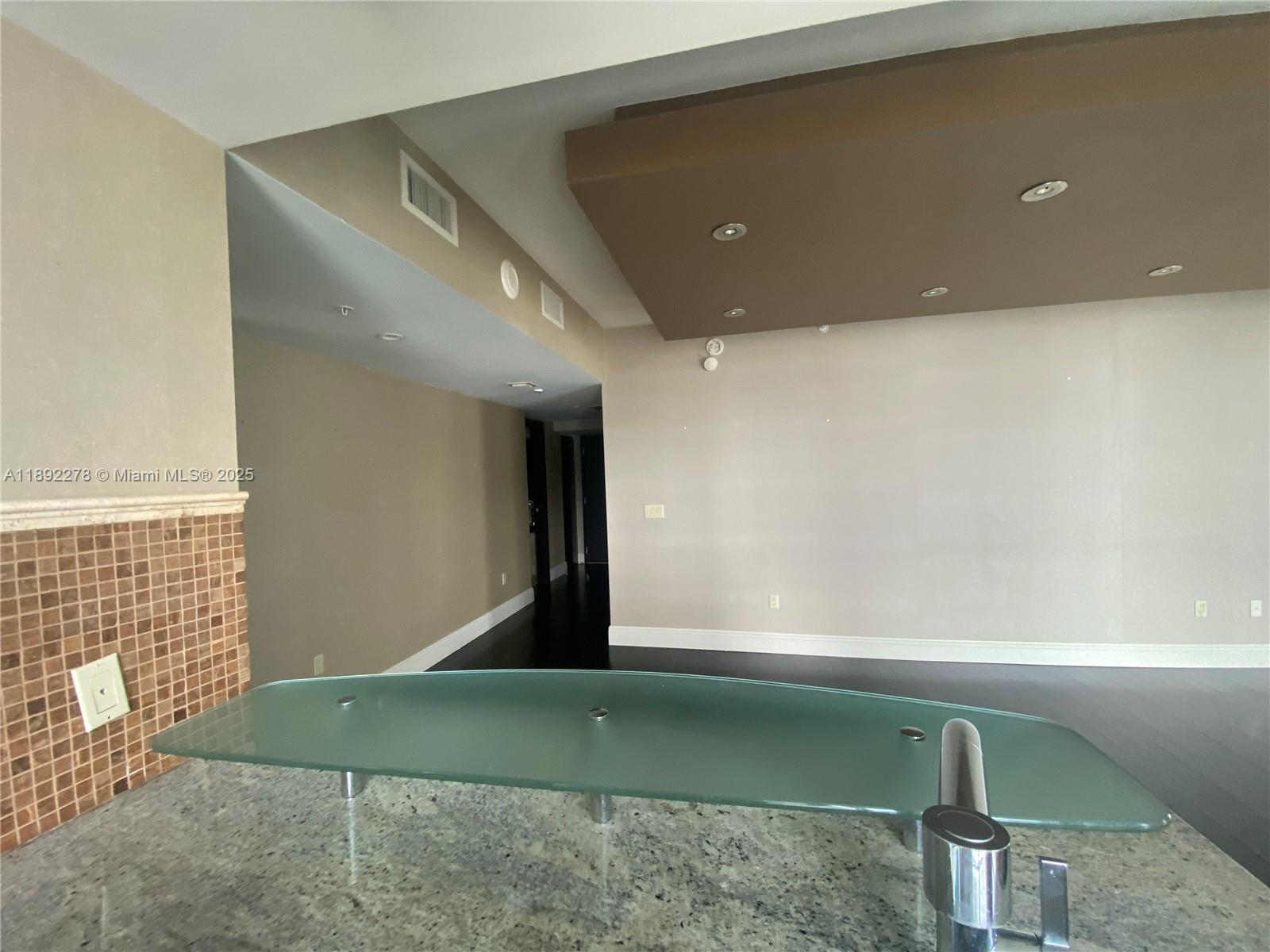 185 Southwest 7th Street, Unit 2312 Miami, FL 33130 - Photo 7 of 32 a view of a room with windows