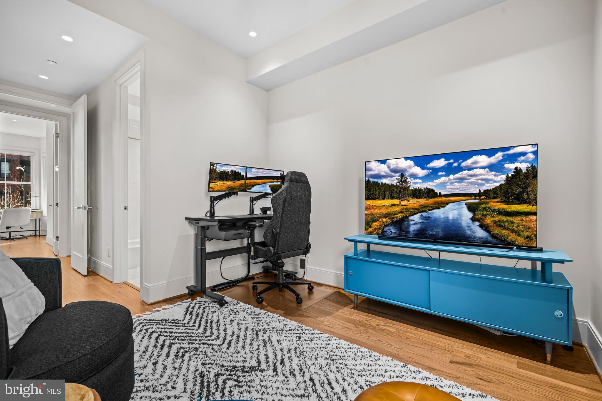 270 15th Street Southeast, Unit 301 Washington, DC 20003 - Photo 22 of 31 a bedroom with furniture and wooden floor