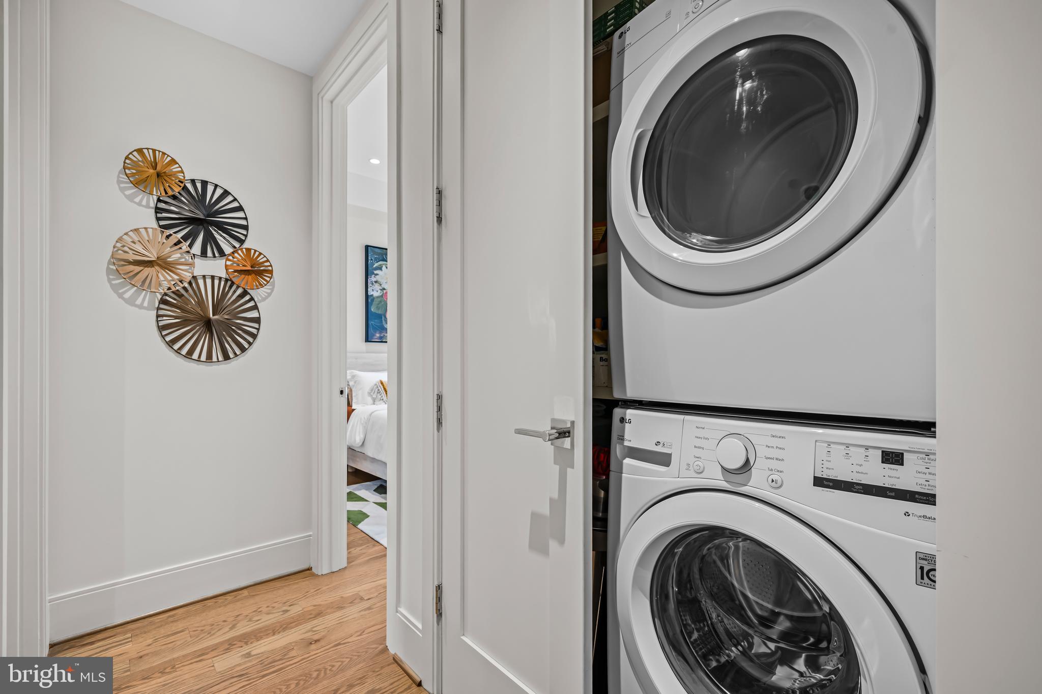 270 15th Street Southeast, Unit 301 Washington, DC 20003 - Photo 26 of 31 a view of a hallway with washer and dryer