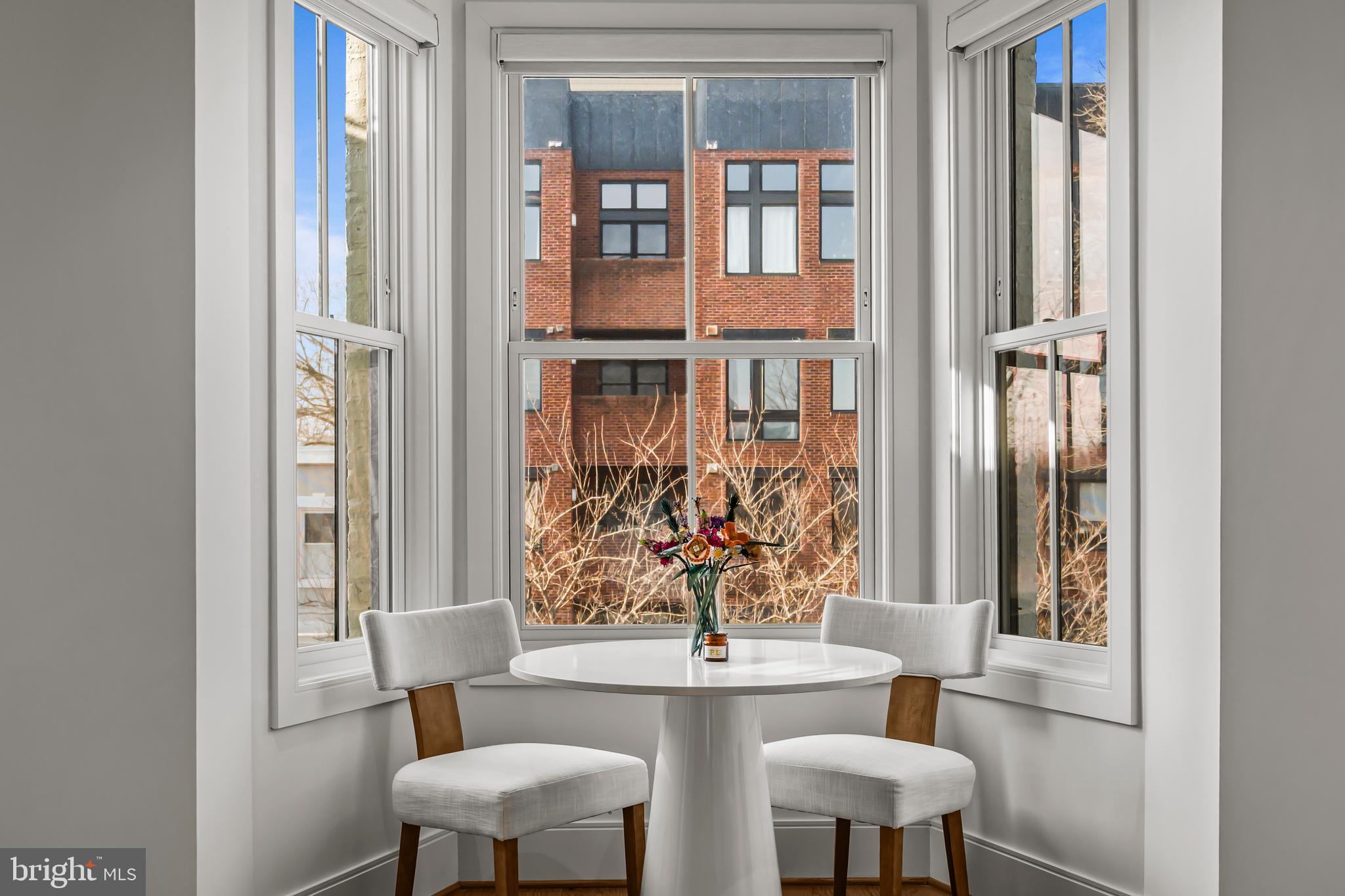 270 15th Street Southeast, Unit 301 Washington, DC 20003 - Photo 9 of 31 a view of a dining room with furniture and a window