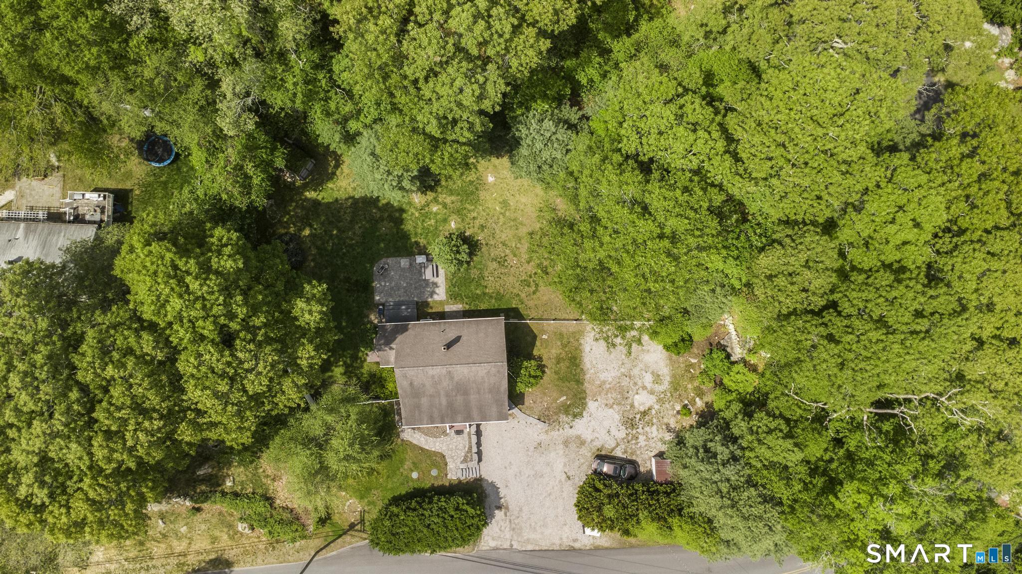 13 Christy Hill Road Ledyard, CT 06335 - Photo 37 of 38 an aerial view of a house with a yard