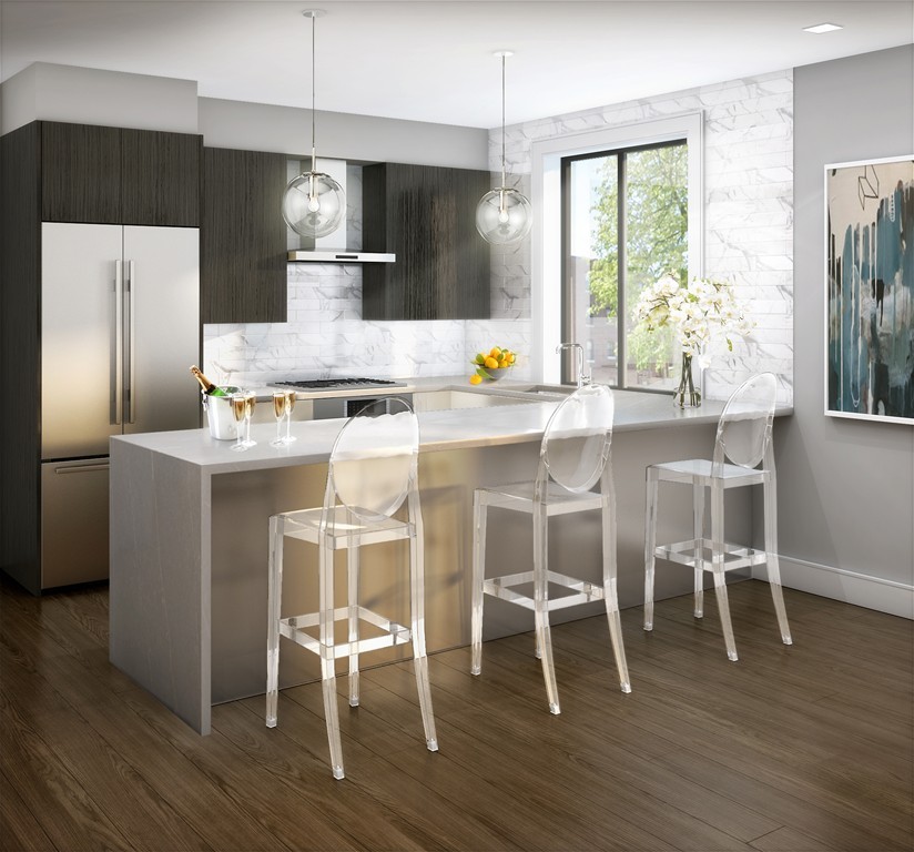 44-50 Symphony Road, Unit 104 Boston, MA 02115 - Photo 2 of 6 a kitchen with stainless steel appliances granite countertop a dining table chairs refrigerator and sink