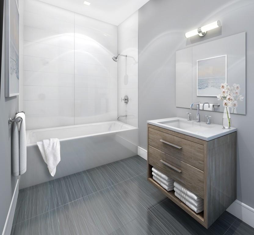 44-50 Symphony Road, Unit 104 Boston, MA 02115 - Photo 4 of 6 a bathroom with a sink a mirror and a bathtub