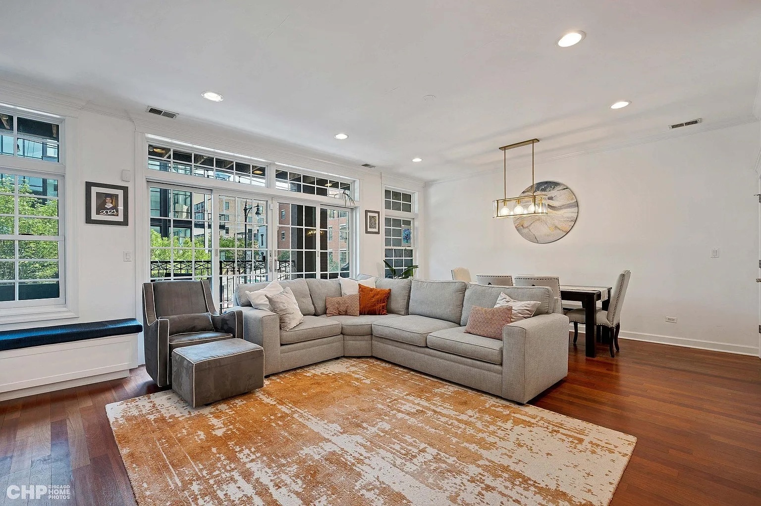 1035 West Madison Street, Unit 2 Chicago, IL 60607 - Photo 6 of 17 a living room with furniture and a large window