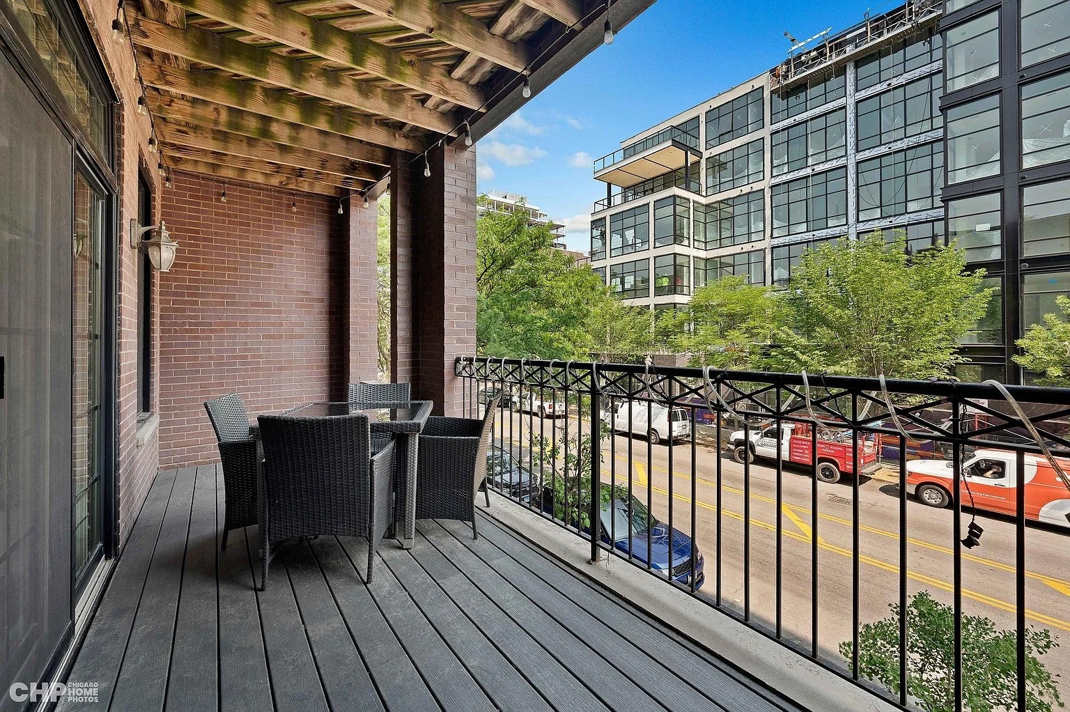 1035 West Madison Street, Unit 2 Chicago, IL 60607 - Photo 8 of 17 a view of a balcony with chairs
