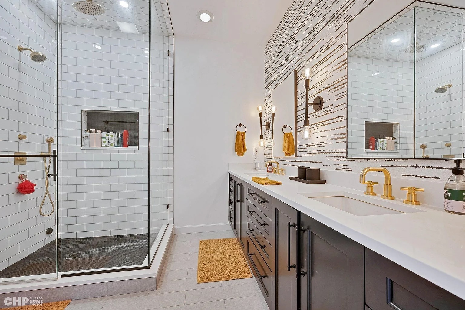 1035 West Madison Street, Unit 2 Chicago, IL 60607 - Photo 10 of 17 a bathroom with a sink and a mirror