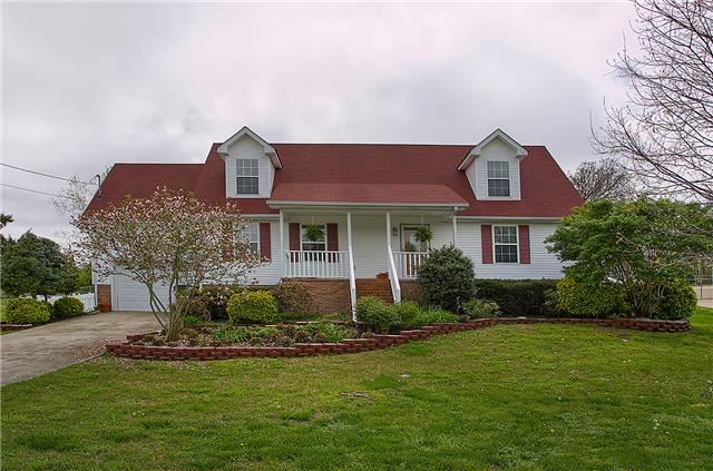 629 Peach Valley Road Gallatin, TN 37066 - Photo 1 of 20 Impressive Cape Cod in private setting. Large deck. Fenced backyard.Raised stone walls line sidewalk. Beautifully landscaped. Walk to Gallatin Marina.