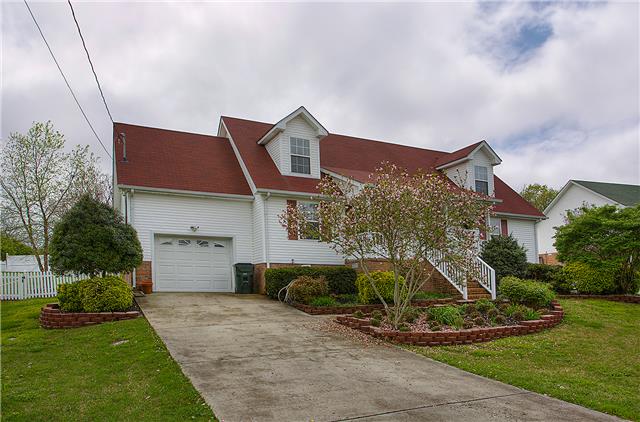 629 Peach Valley Road Gallatin, TN 37066 - Photo 2 of 20 One car attached garage. Nice concrete driveway.