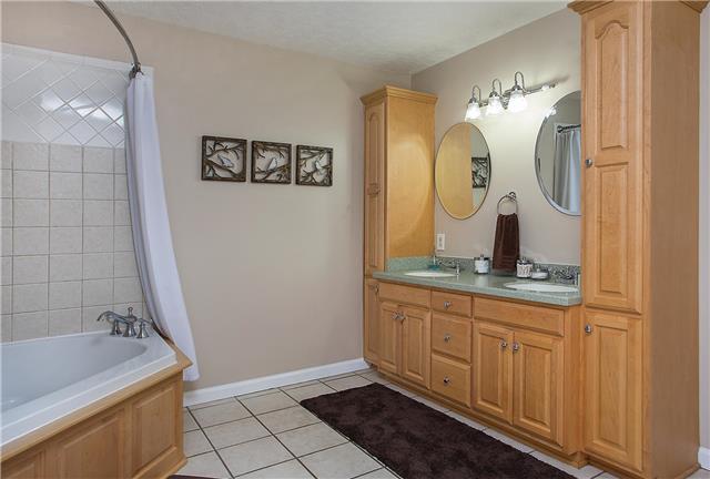 629 Peach Valley Road Gallatin, TN 37066 - Photo 12 of 20 Master bath with deep jetted corner tub. There is also a walk in closet.