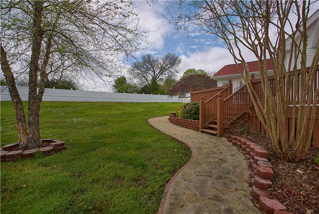 629 Peach Valley Road Gallatin, TN 37066 - Photo 18 of 20 Beautiful sidewalk and landscaping. Huge backyard.