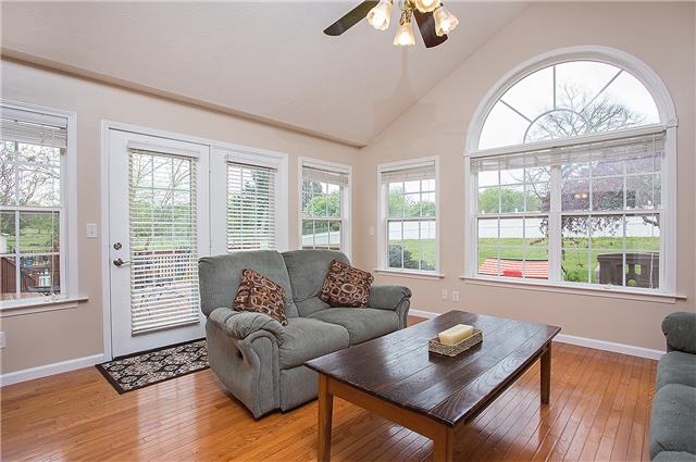 629 Peach Valley Road Gallatin, TN 37066 - Photo 8 of 20 Impressive den with vaulted ceiling and Palladian window. Double french door leads to bi-level deck. Stunning views of the lovely backyard.