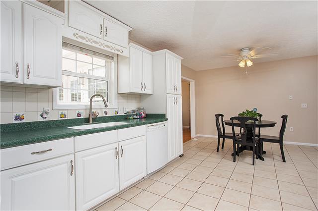 629 Peach Valley Road Gallatin, TN 37066 - Photo 9 of 20 Massive kitchen offers pantry, pantry closet and solids surface counters.