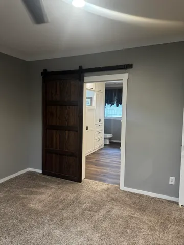 a view of an empty room and window