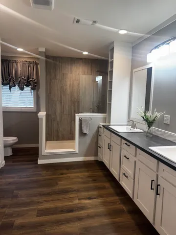 a view of a closet area with an empty room