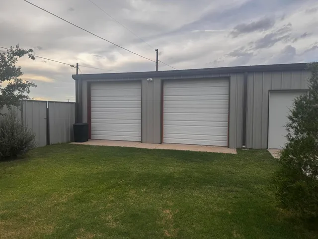 a view of a backyard of the house