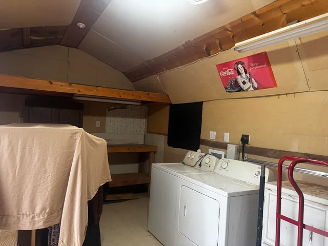 a kitchen with a sink and a refrigerator