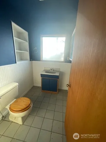 a bathroom with a sink and a toilet