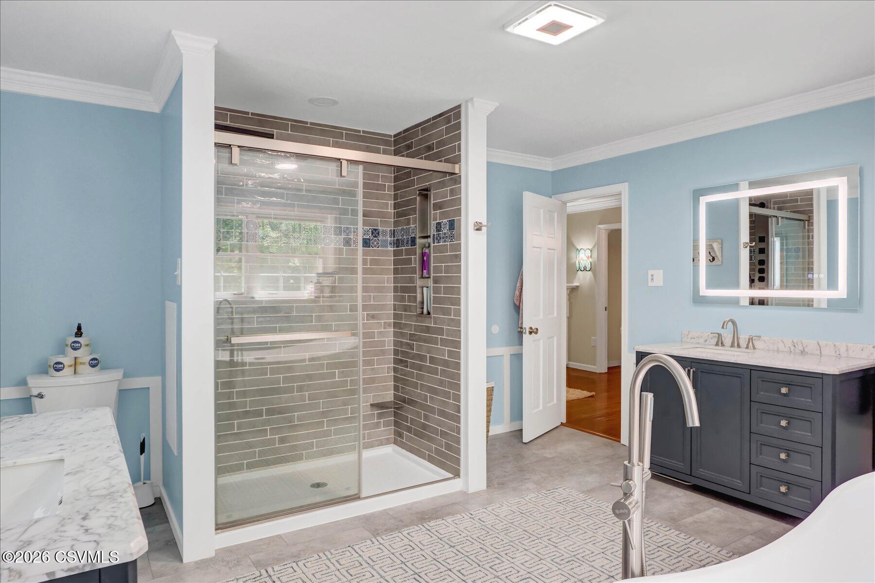65 Crestview Drive Winfield, PA 17889 - Photo 28 of 70 a bathroom with a tub sink and shower