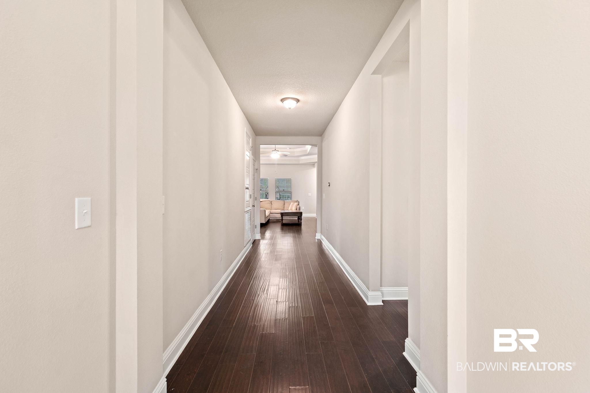 12750 B Jenkins Pit Road Daphne, AL 36527 - Photo 13 of 89 Hall featuring baseboards and dark wood finished floors