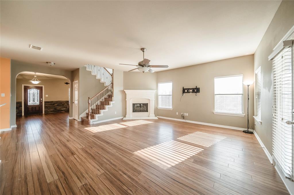 1117 Baylor Road Melissa, TX 75454 - Photo 19 of 40 wooden floor in an empty room with a window
