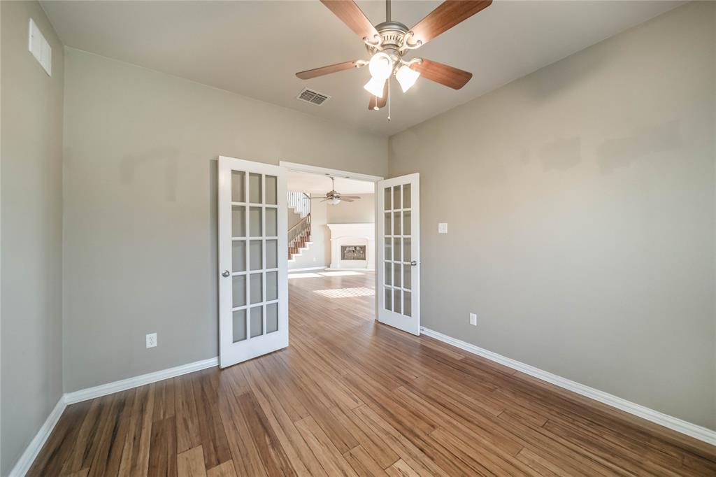 1117 Baylor Road Melissa, TX 75454 - Photo 22 of 40 wooden floor in an empty room with a window