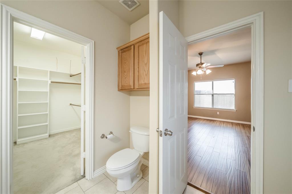 1117 Baylor Road Melissa, TX 75454 - Photo 28 of 40 a bathroom with a toilet shower and a sink