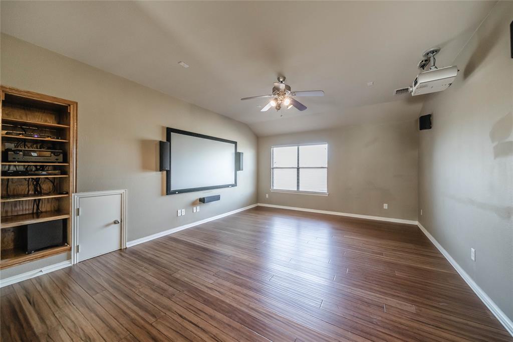 1117 Baylor Road Melissa, TX 75454 - Photo 31 of 40 wooden floor in an empty room with a window