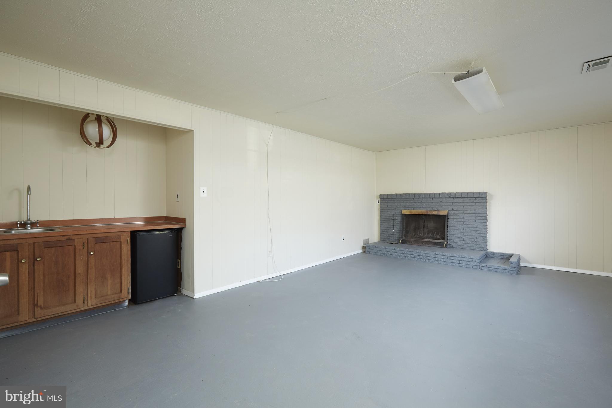 12901 Layhill Road Silver Spring, MD 20906 - Photo 22 of 30 a view of an empty room with kitchen