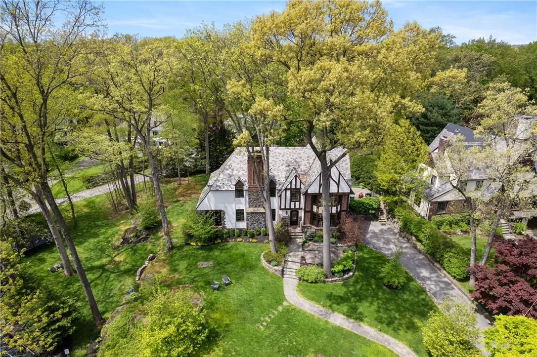 Welcome to 10 Beechtree Drive sited on a beautiful cul-de-sac in Larchmont Woods.