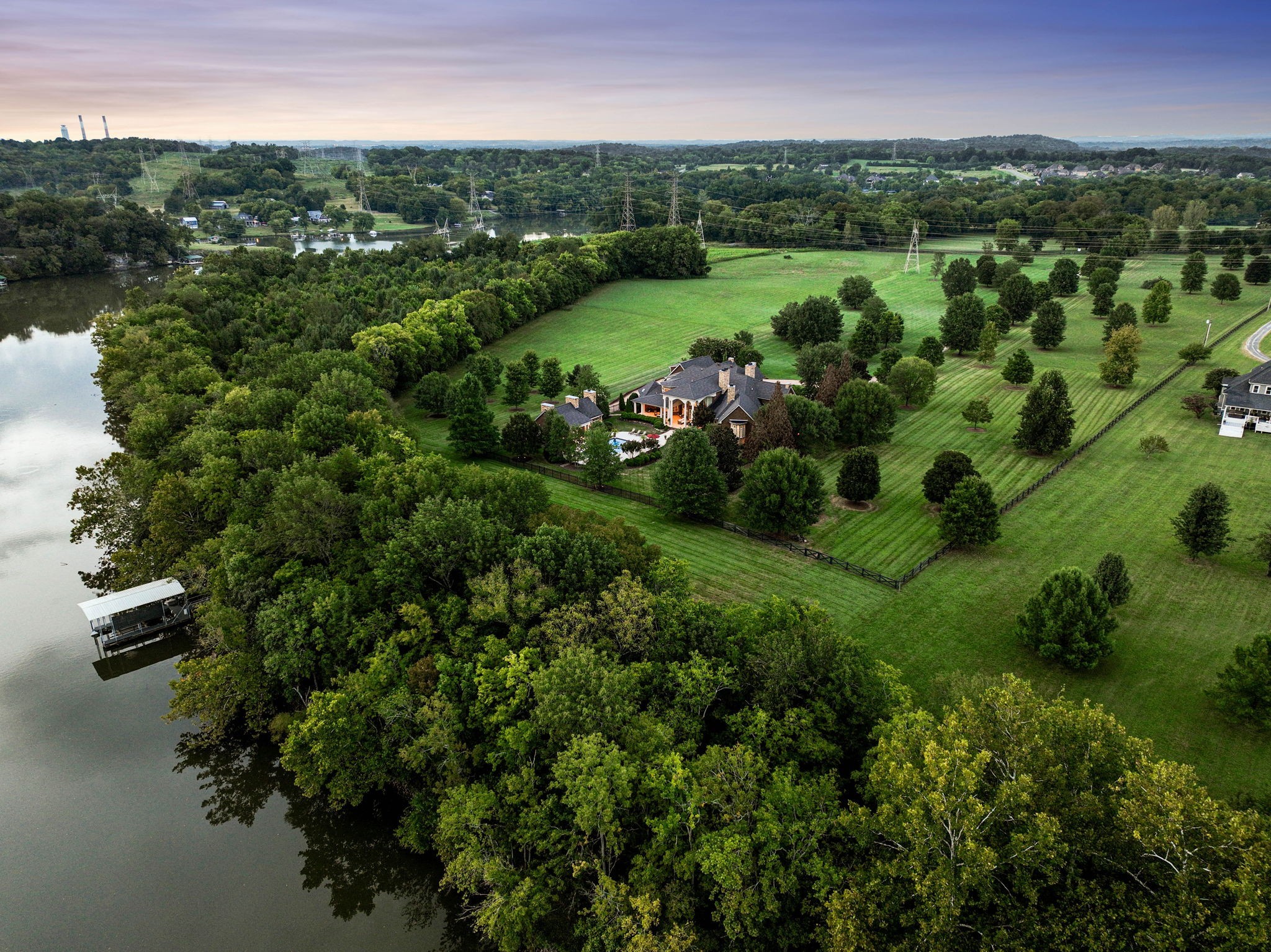 510 Davis Road Lebanon, TN 37087 - Photo 2 of 70 a view of a green field with plants and large trees