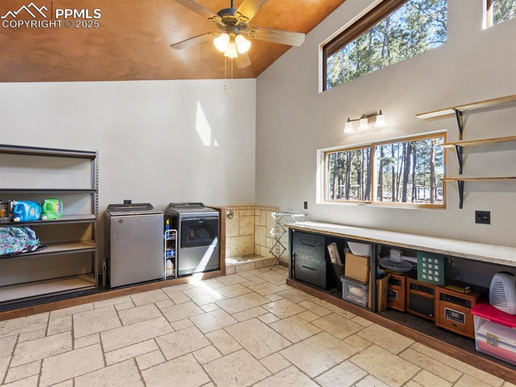 10530 Hungate Road Colorado Springs, CO 80908 - Photo 20 of 42 a kitchen with stainless steel appliances granite countertop a stove and a refrigerator