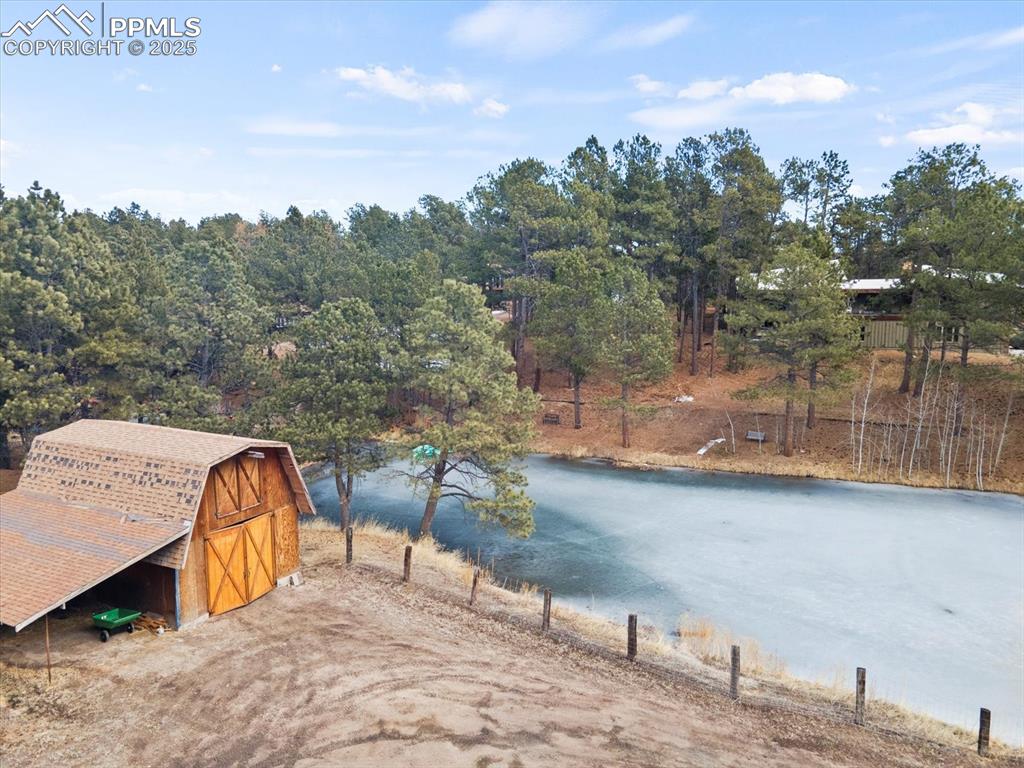 10530 Hungate Road Colorado Springs, CO 80908 - Photo 41 of 42 a view of a outdoor space with trees