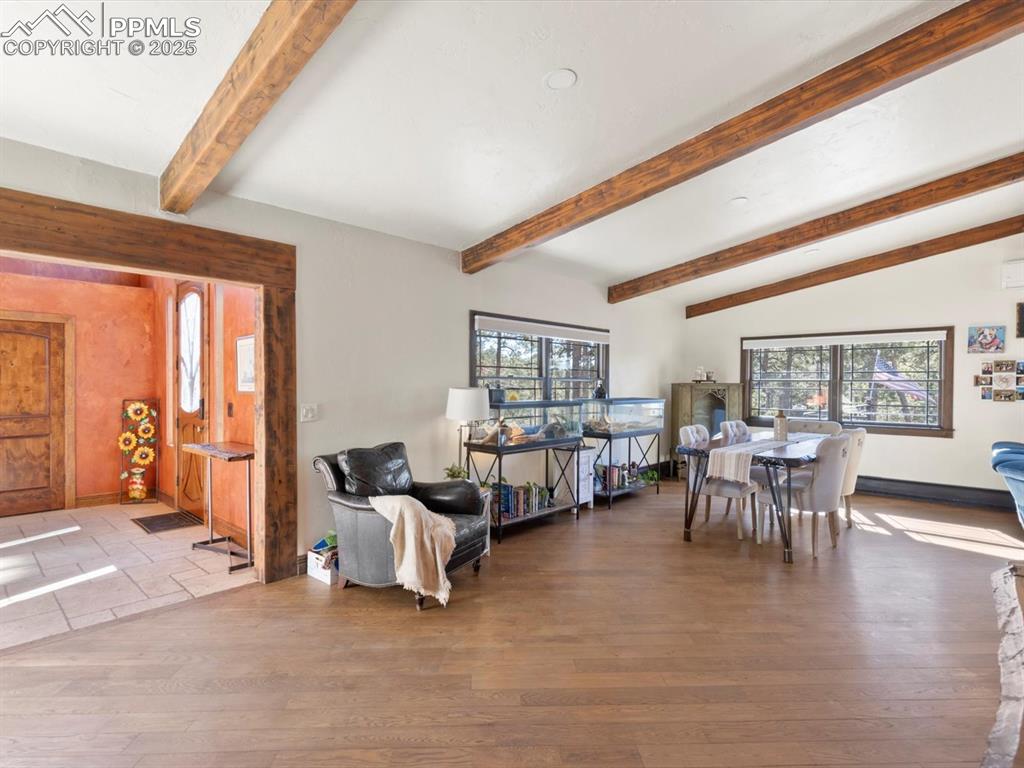 10530 Hungate Road Colorado Springs, CO 80908 - Photo 5 of 42 a living room with furniture and a large window