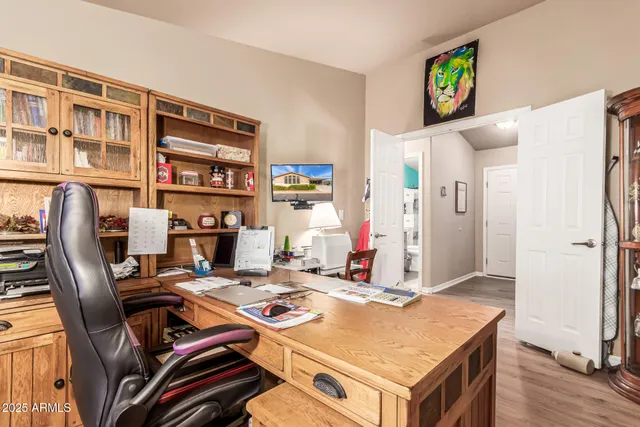 a view of a workspace with furniture and toys