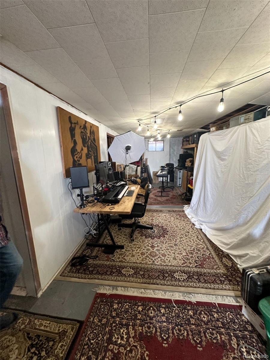 1265 Yates Street Denver, CO 80204 - Photo 16 of 17 a living room with furniture