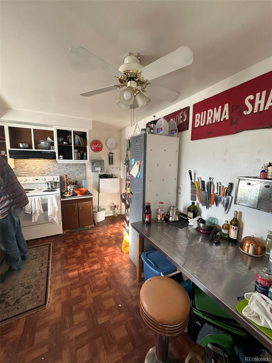 1265 Yates Street Denver, CO 80204 - Photo 6 of 17 a view of a room with gym equipment