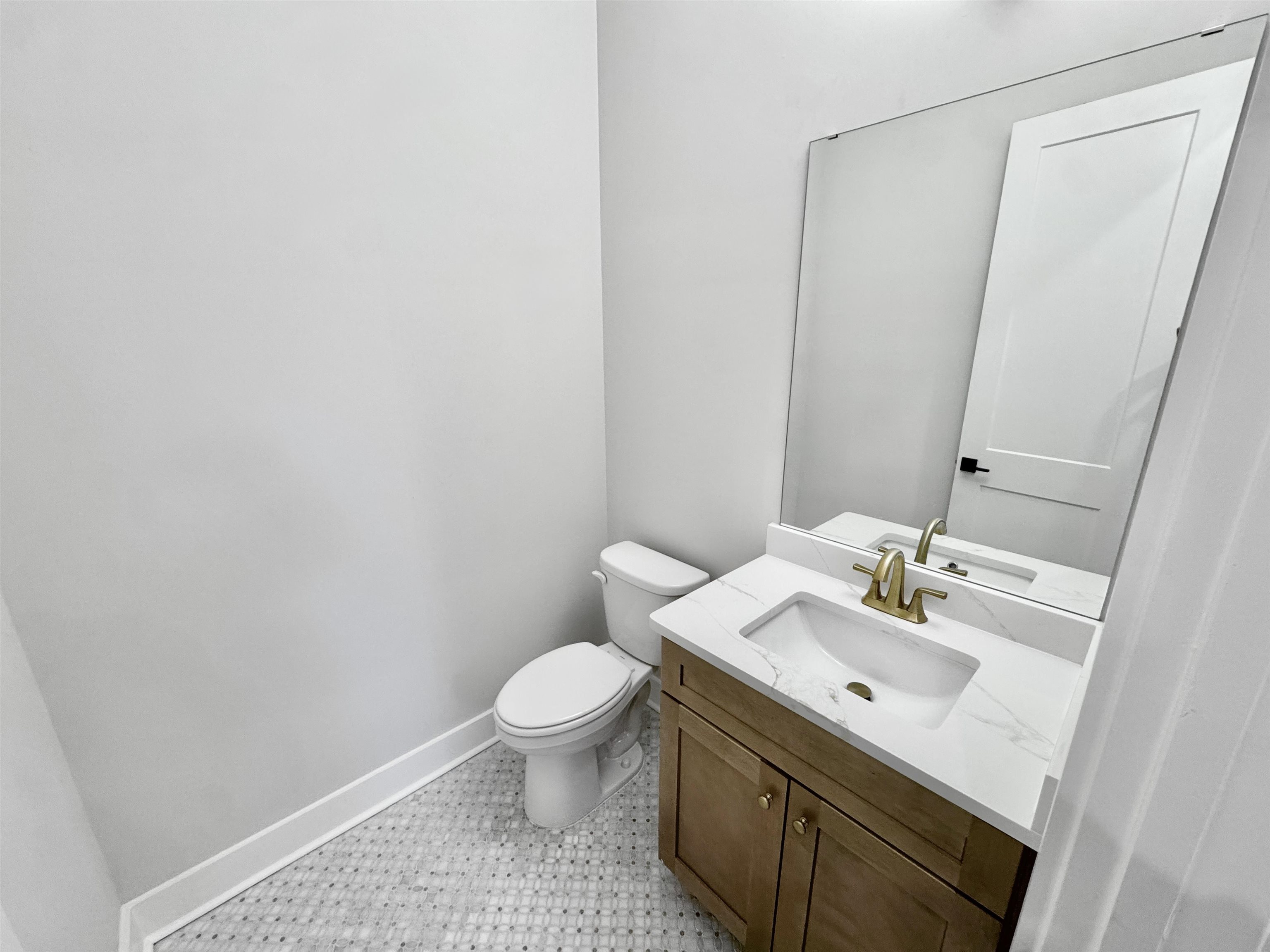 354 Avon Road Memphis, TN 38117 - Photo 26 of 40 Bathroom featuring vanity and baseboards