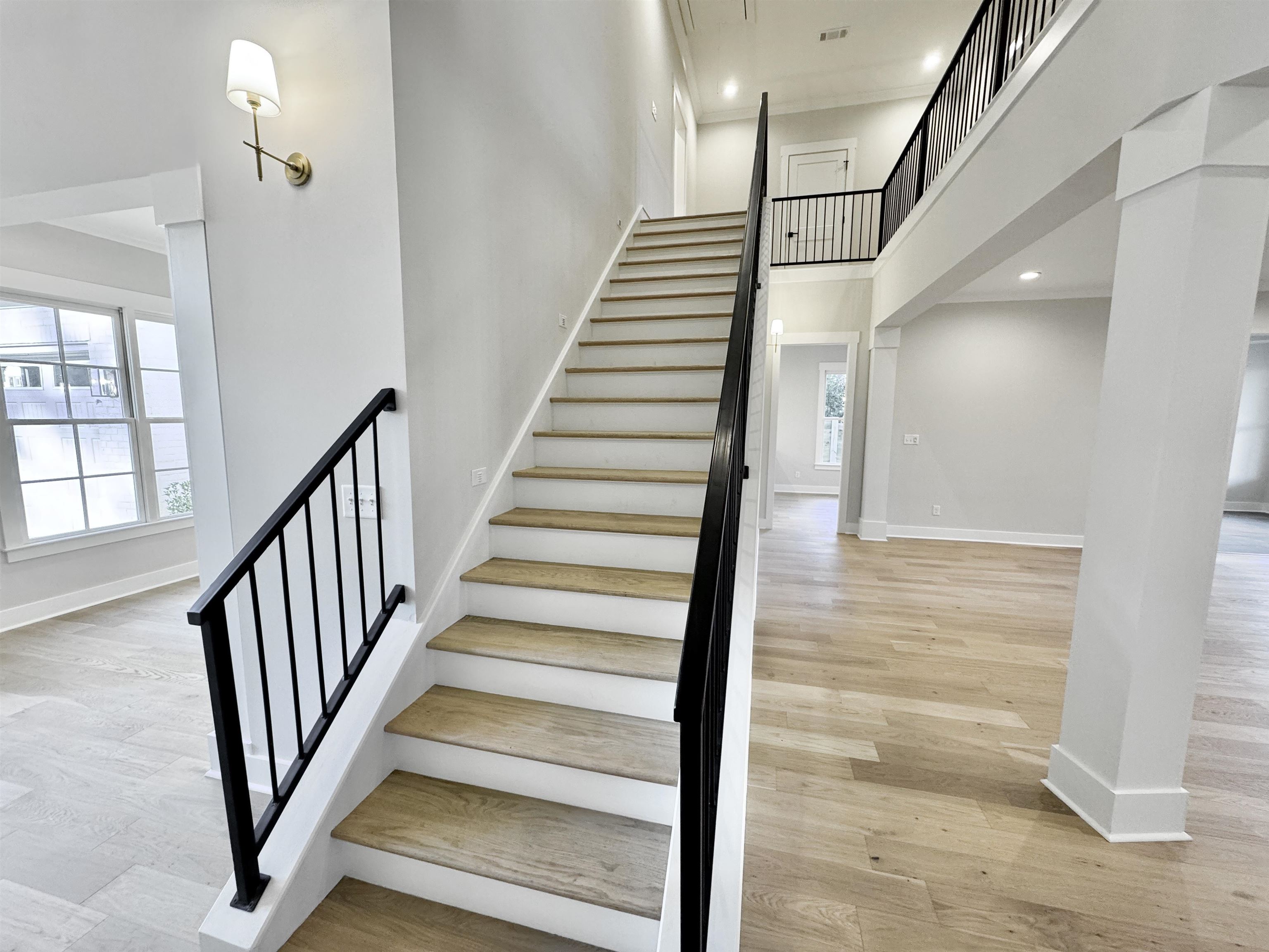 354 Avon Road Memphis, TN 38117 - Photo 28 of 40 Stairs with wood finished floors, recessed lighting, a towering ceiling, and crown molding