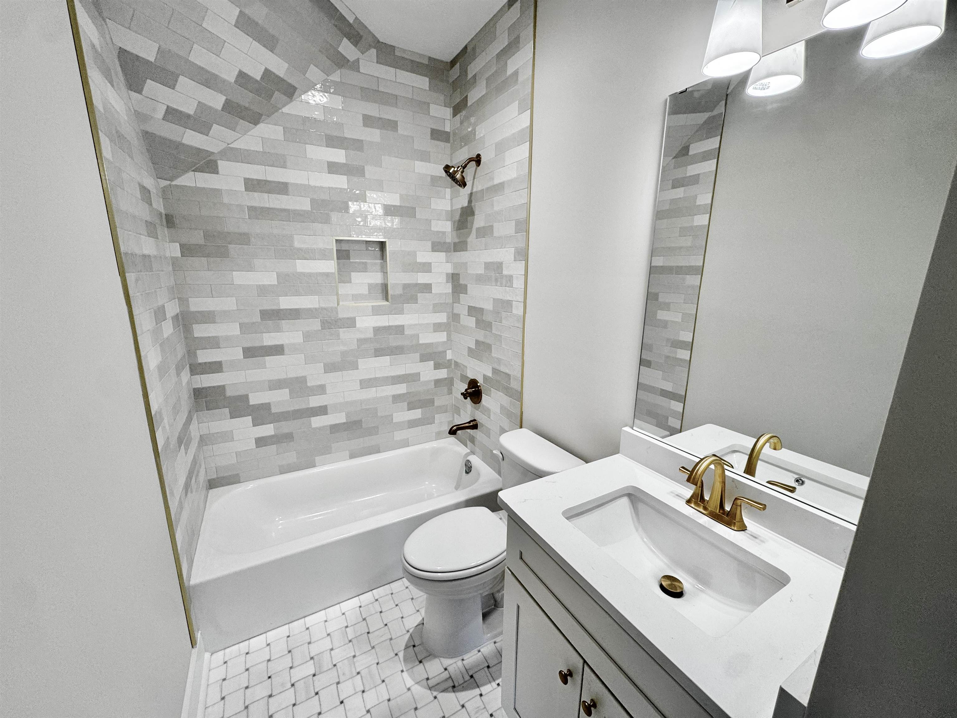 354 Avon Road Memphis, TN 38117 - Photo 32 of 40 Bathroom featuring shower / bath combination and vanity