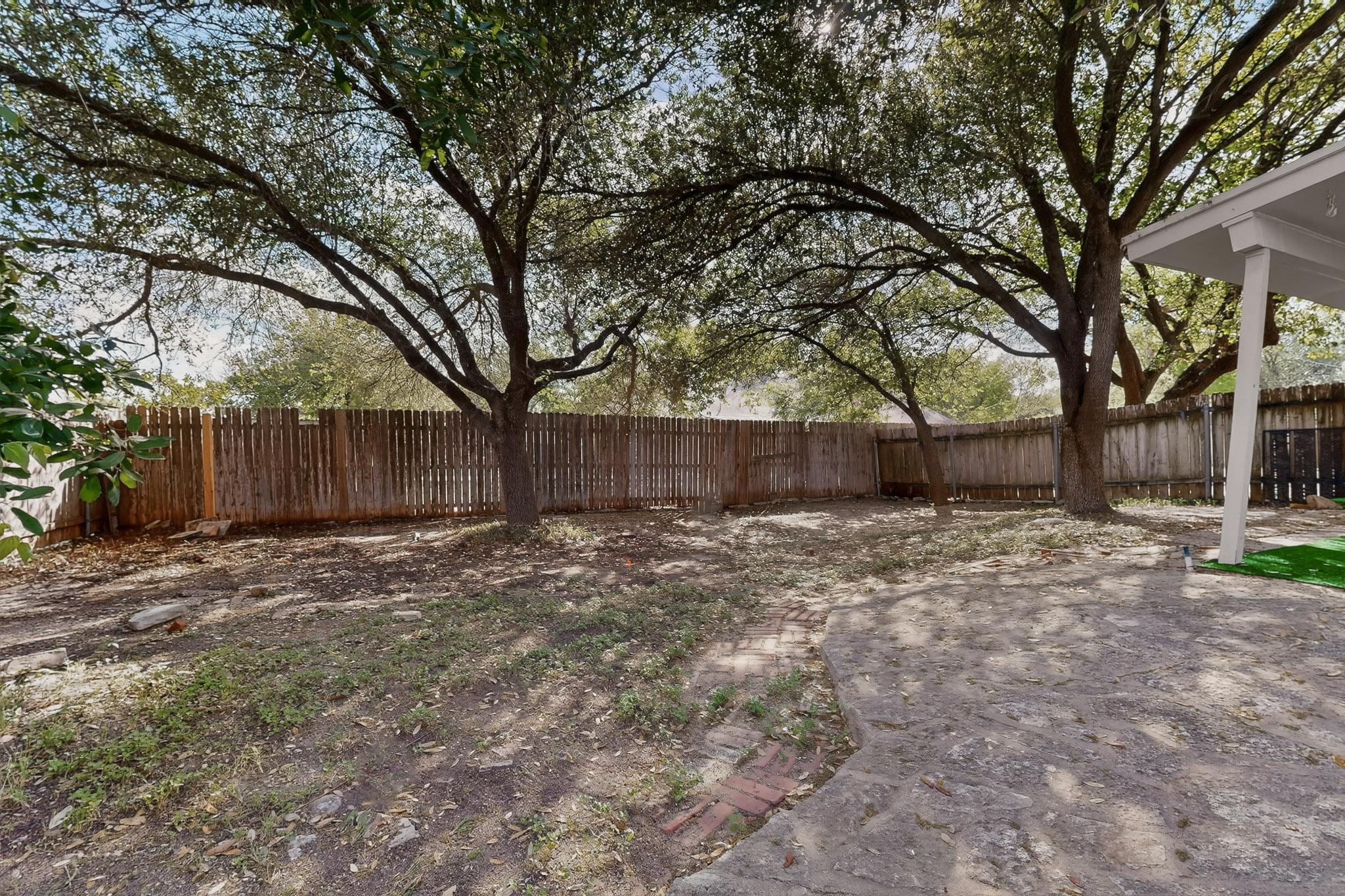 812 George Street Taylor, TX 76574 - Photo 27 of 34 Fenced backyard featuring a patio area