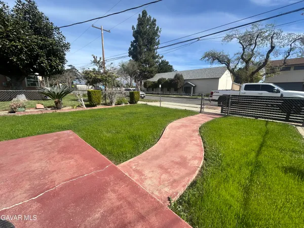a garden view with a seating space