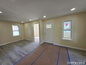 1-3 Chestnut Street Middletown, NY 10940 - Photo 3 of 19 a view of an empty room and window